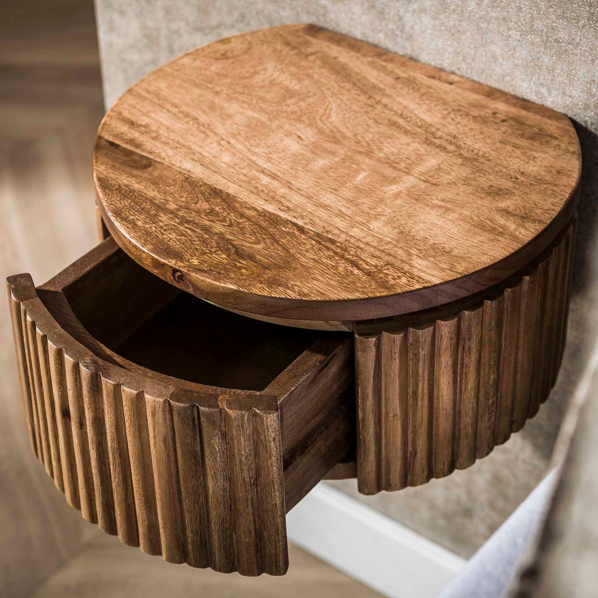 Floating bedside table Curve round 1-drawer Mango wood sand