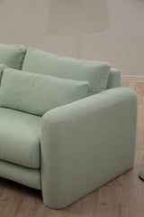 Corner sofa on the left lily green