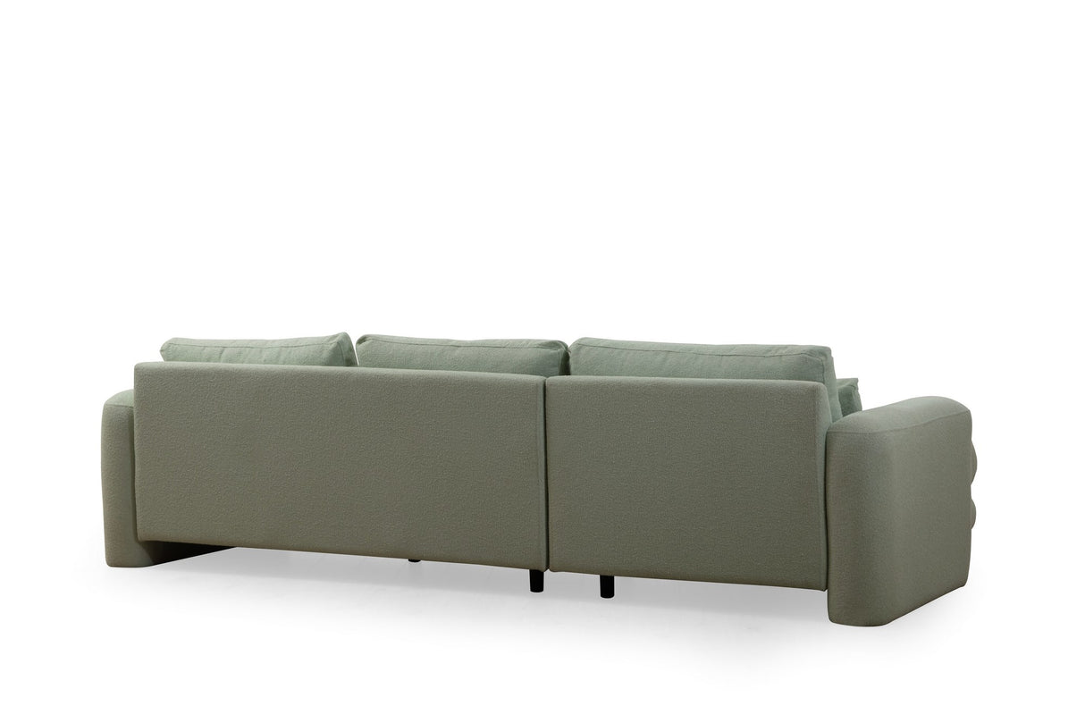 Corner sofa on the left lily green