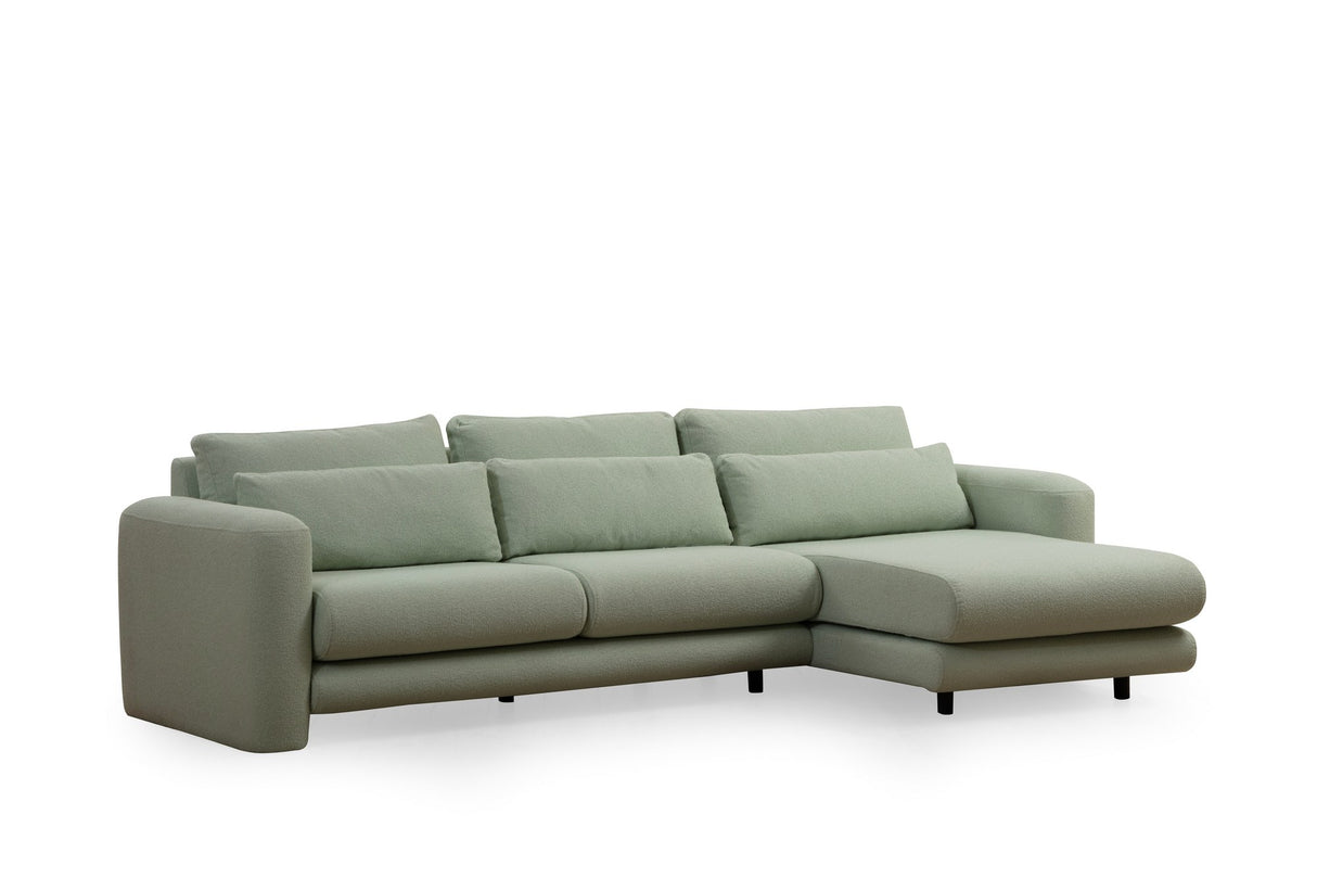 Corner sofa on the right lily green