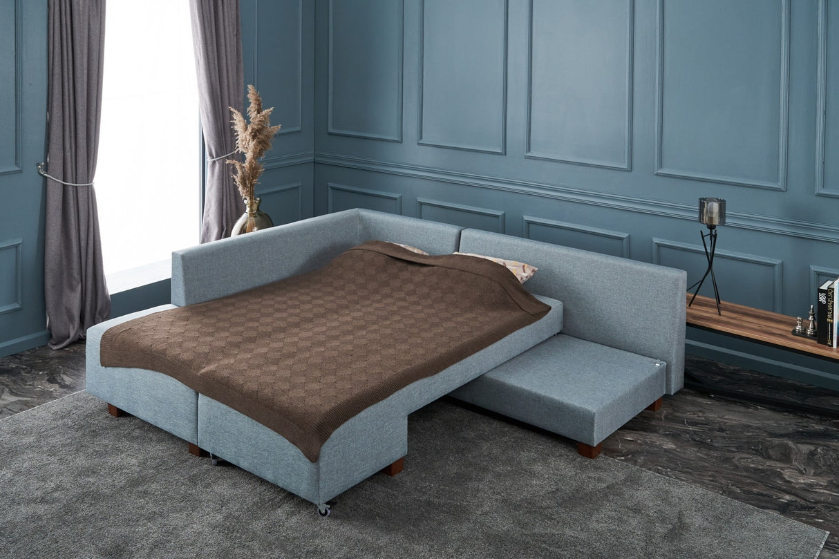 Corner sofa with sleeping function on the left manama light blue