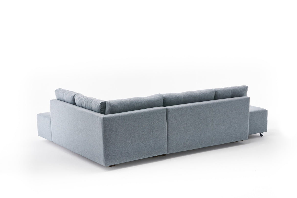 Corner sofa with sleeping function on the right manama light blue