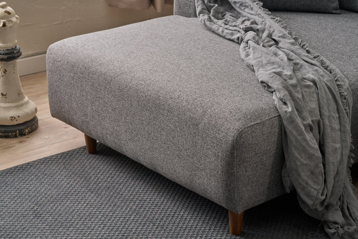 Corner sofa with sleeping function on the left man gray