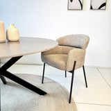 Dining chair Lola boucle fabric beige with round back and arm 
